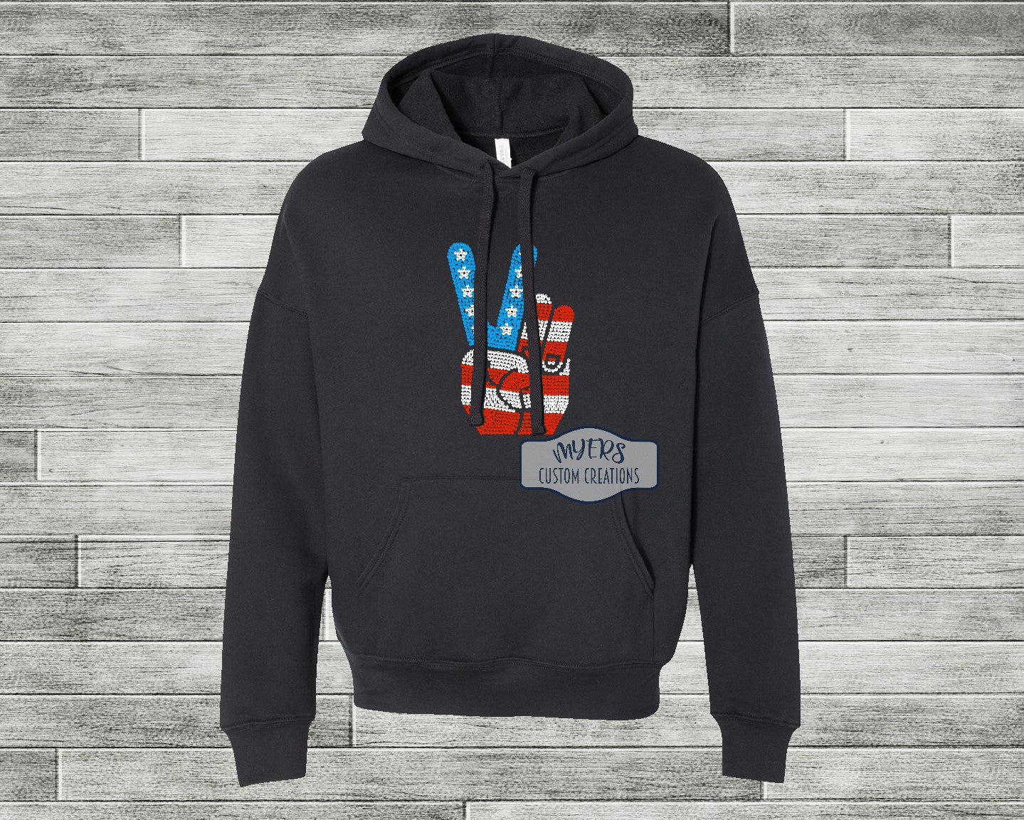 American Flag Peace Sign Rhinestone black Bella+Canvas hoodie with blue, crystal, and red siam rhinestones