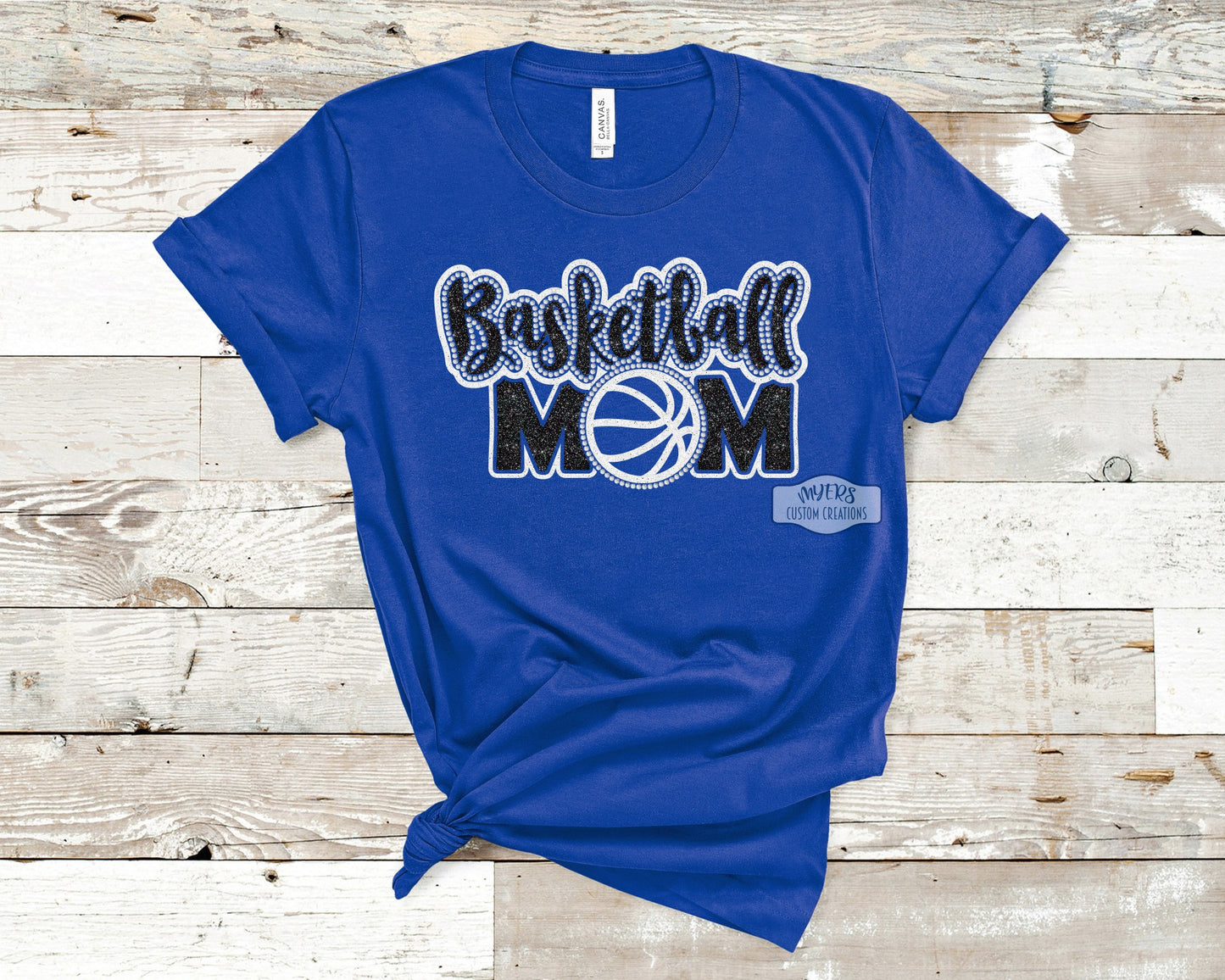 Basketball Mom Rhinestone Multi-Dec royal blueBella+Canvas shirt with white glitter, black glitter, and crystal rhinestones