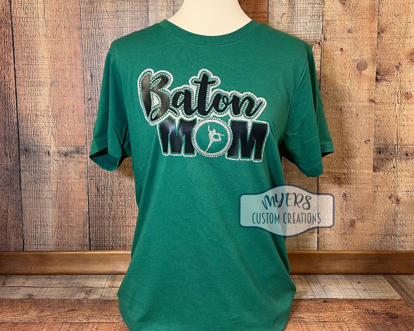 Baton Mom Medium t-shirt - Kelly Green Bella+Canvas - silver glitter & black HTV and crystal rhinestones