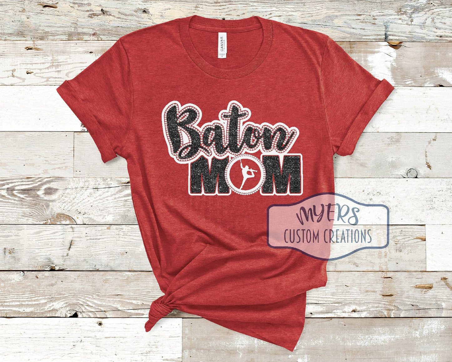 Baton Mom heather red Bella+Canvas t-shirt with white and black glitter HTV and crystal rhinestones