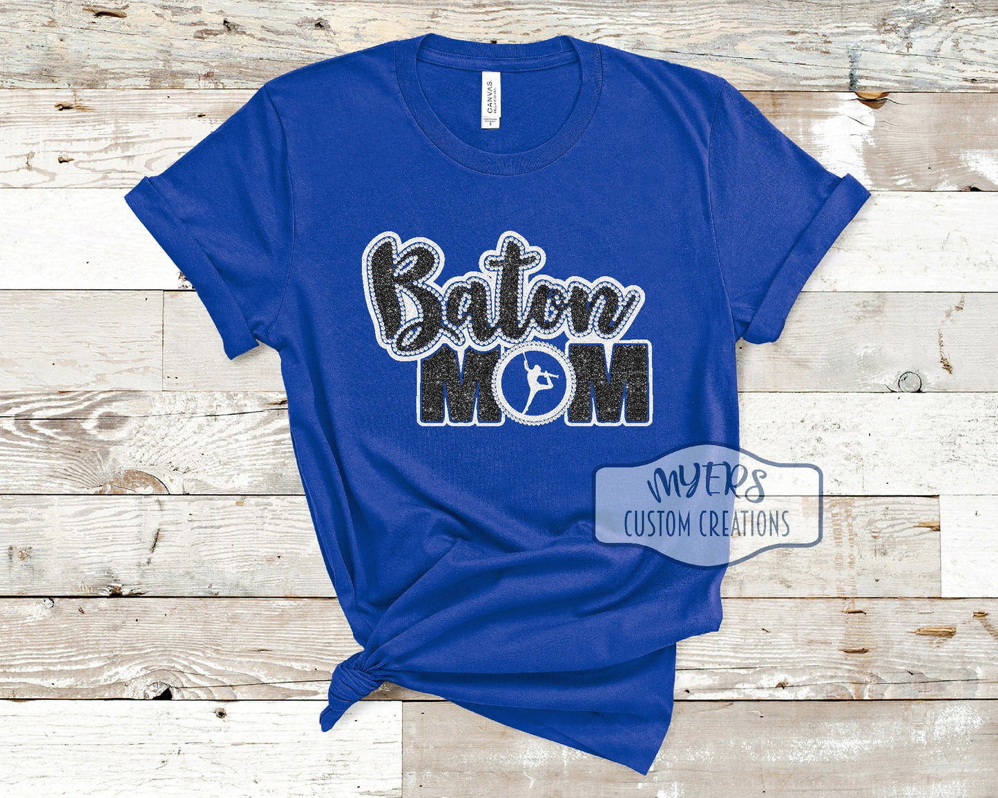 Baton Mom royal blue Bella+Canvas t-shirt with white glitter and black glitter HTV and crystal rhinestones