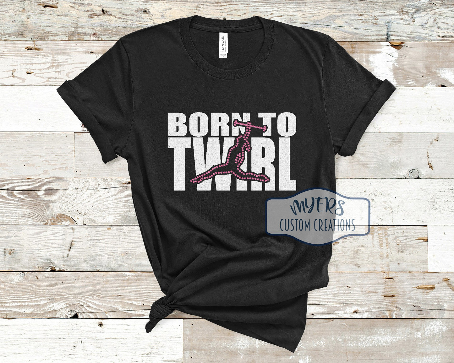 Born To Twirl black Bella Canvas t-shirt with white HTV and pink rhinestones
