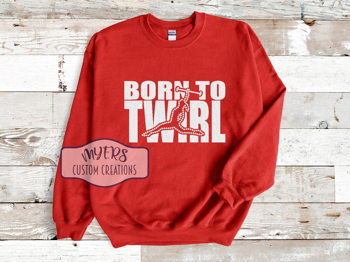 Born To Twirl red Gildan sweatshirt with white HTV and crystal rhinestones