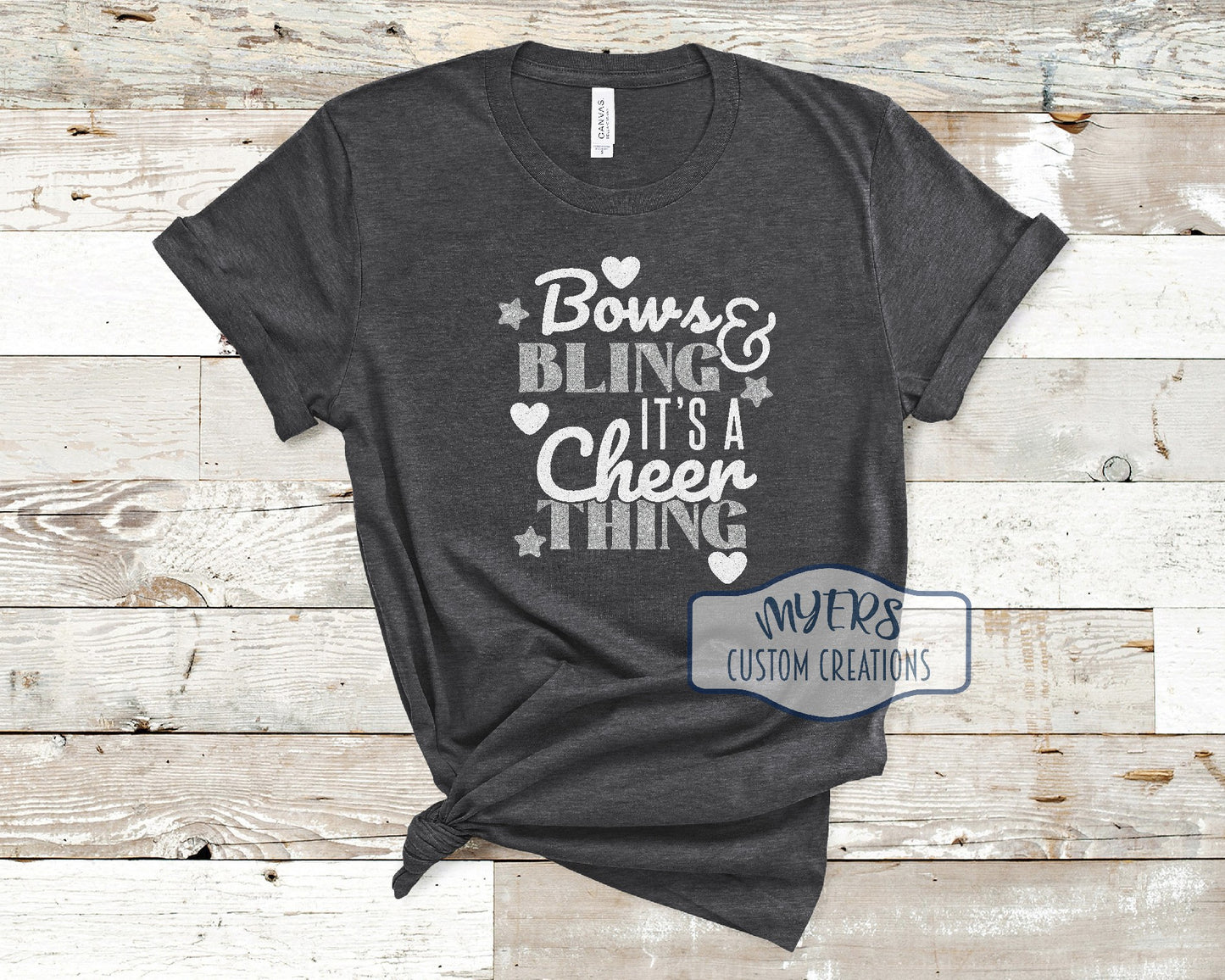 Bows & Bling It's a Cheer Thing heather dark grey Bella Canvas t-shirt with white glitter and silver glitter HTV