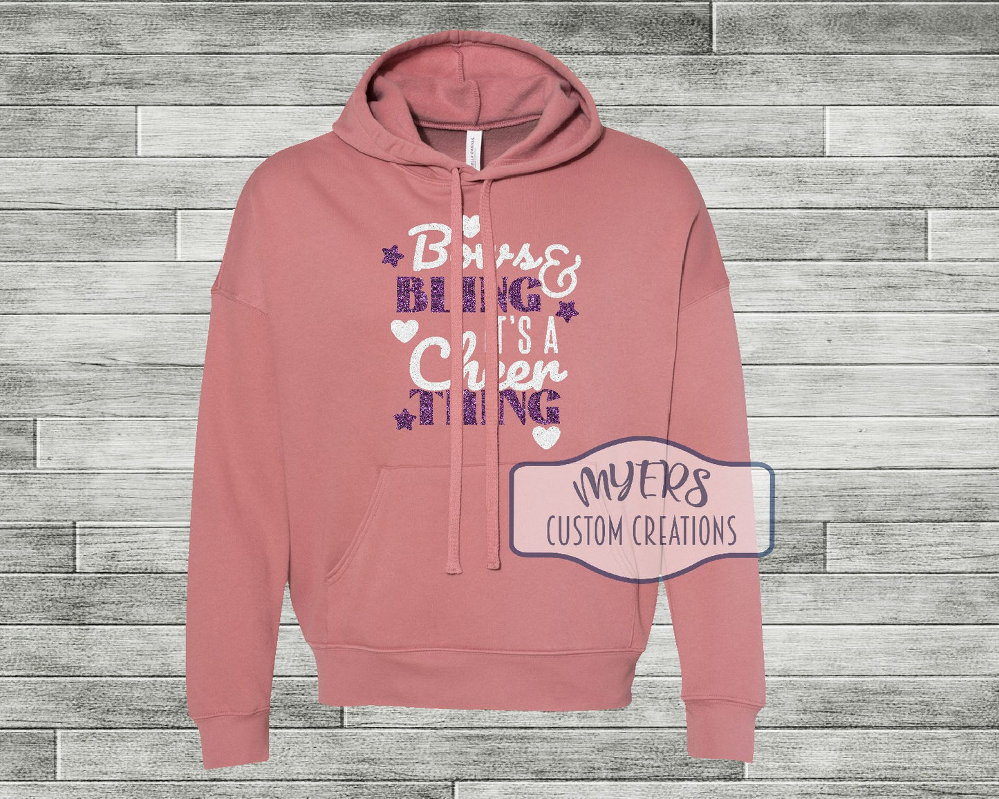 Bows & Bling It's a Cheer Thing mauve Bella Canvas hoodie with white glitter and purple glitter HTV