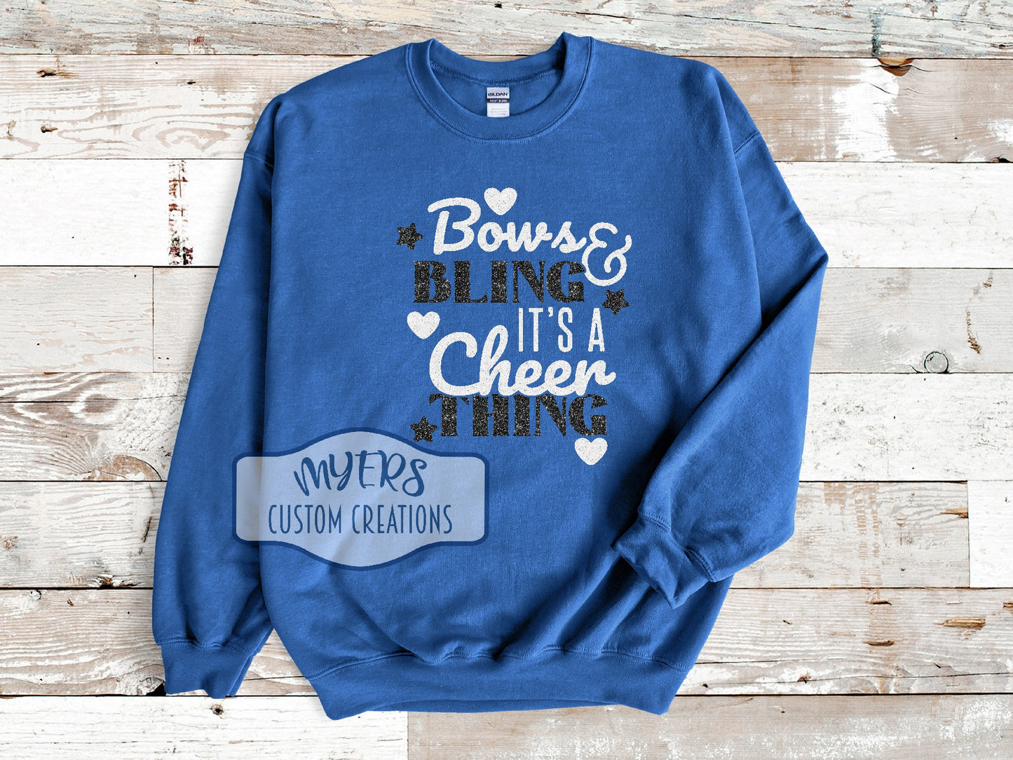 Bows & Bling It's a Cheer Thing royal blue Gildan sweatshirt with white glitter and black glitter HTV