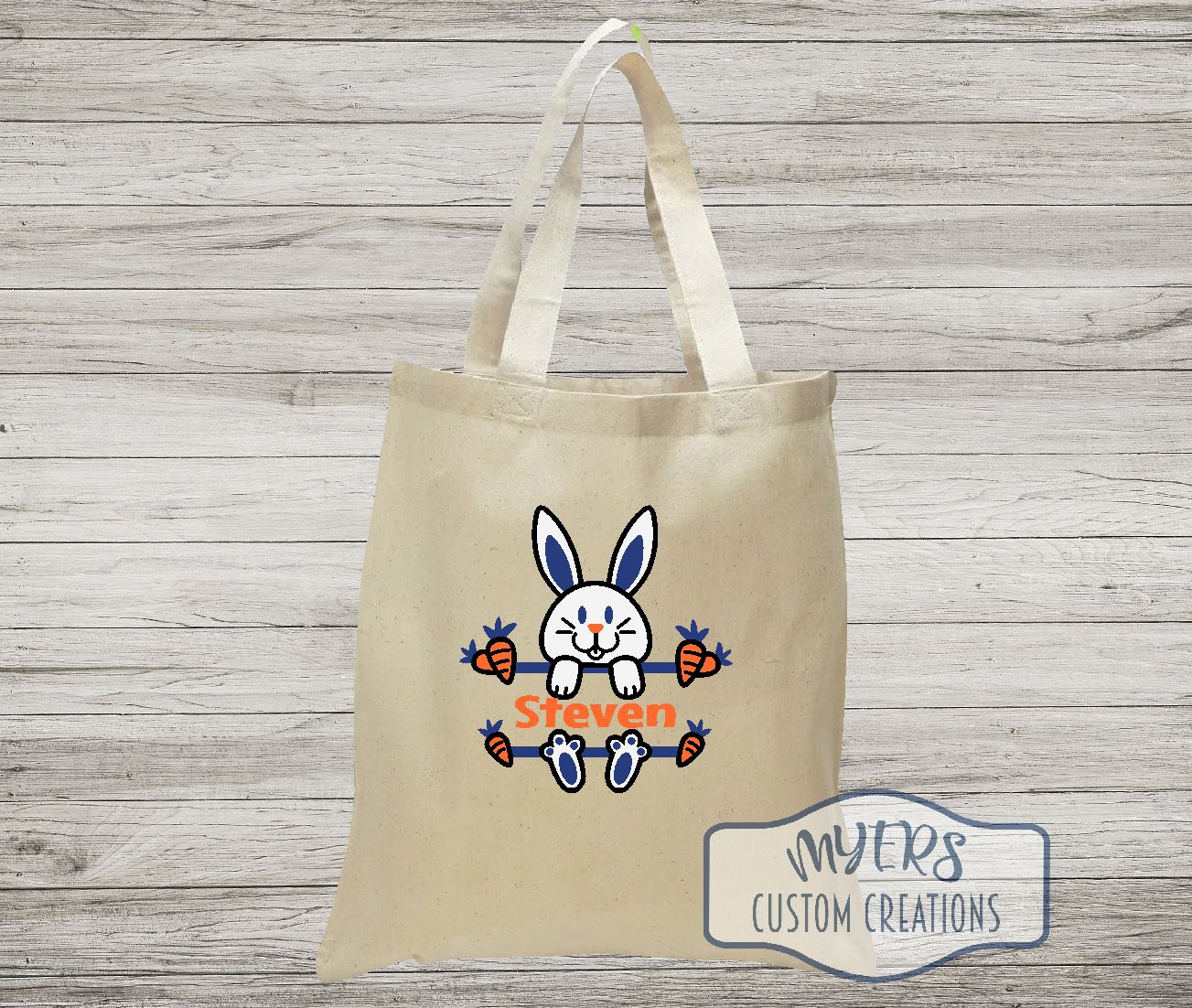 Easter Bunny on a natural canvas Tote Bag with white, black, royal blue, and orange HTV