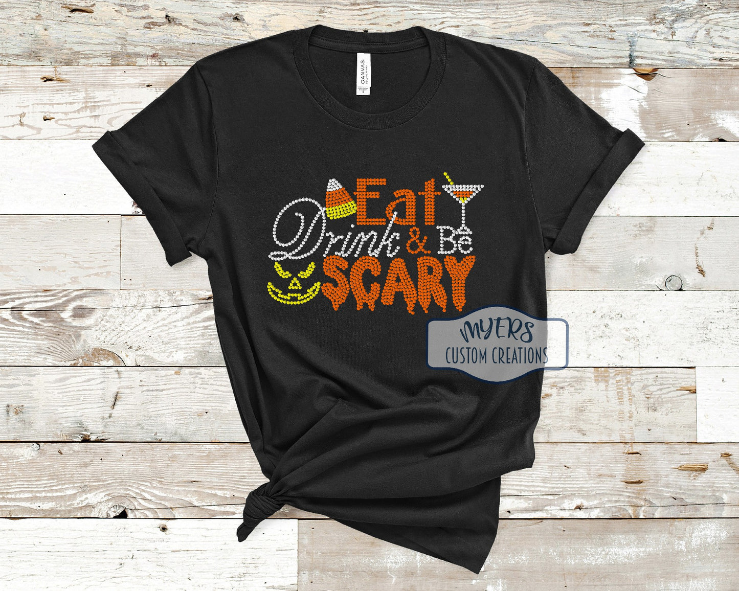 Eat Drink and Be Scary Rhinestone Shirt on Black Bella+Canvas t-shirt with crystal, orange, and citrine rhinestones