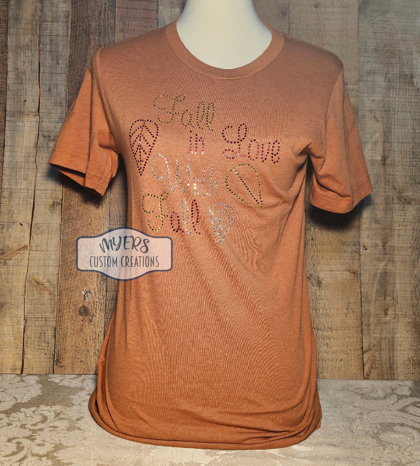 Fall in Love With Fall Rhinestone Heather Autumn Bella+Canvas t-shirt with Premium Diamond Cut Crystal AB, Citrine, & Strawberry rhinestones.