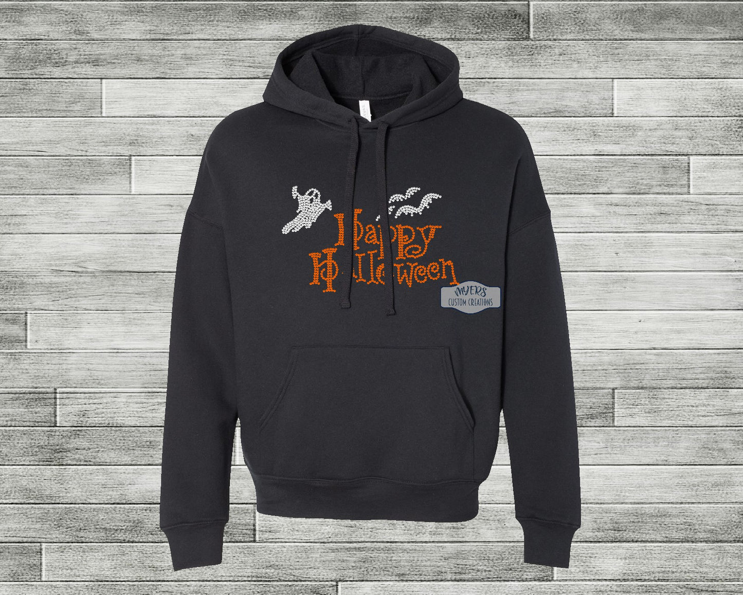 Happy Halloween Rhinestone Black Bella+Canvas hoodie
with crystal and orange rhinestones
