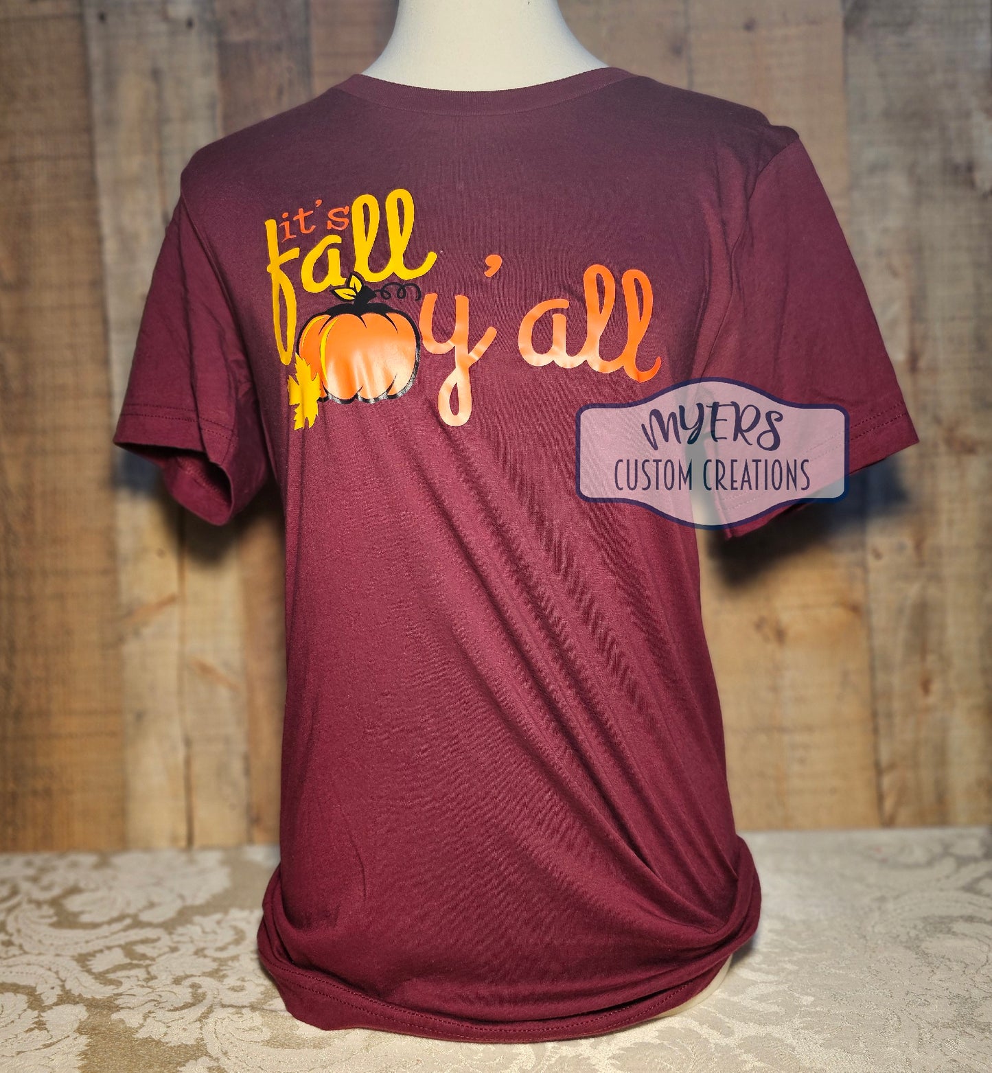 It's Fall Y'all Maroon Bella+Canvas t-shirt with orange, sun, and black HTV