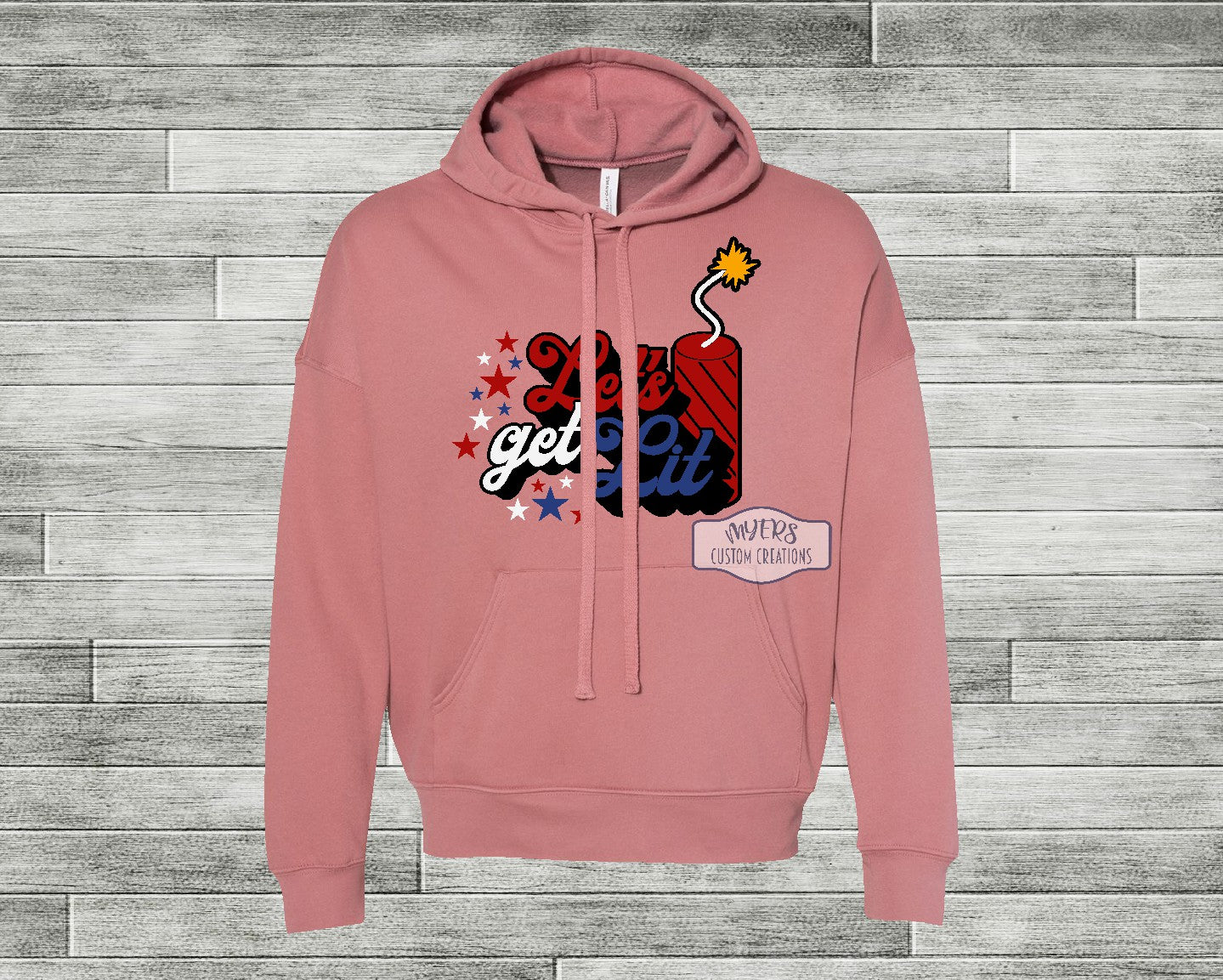 Let's Get Lit Firework mauve Bella+Canvas hoodie with red, white, royal blue, black, and sun HTV