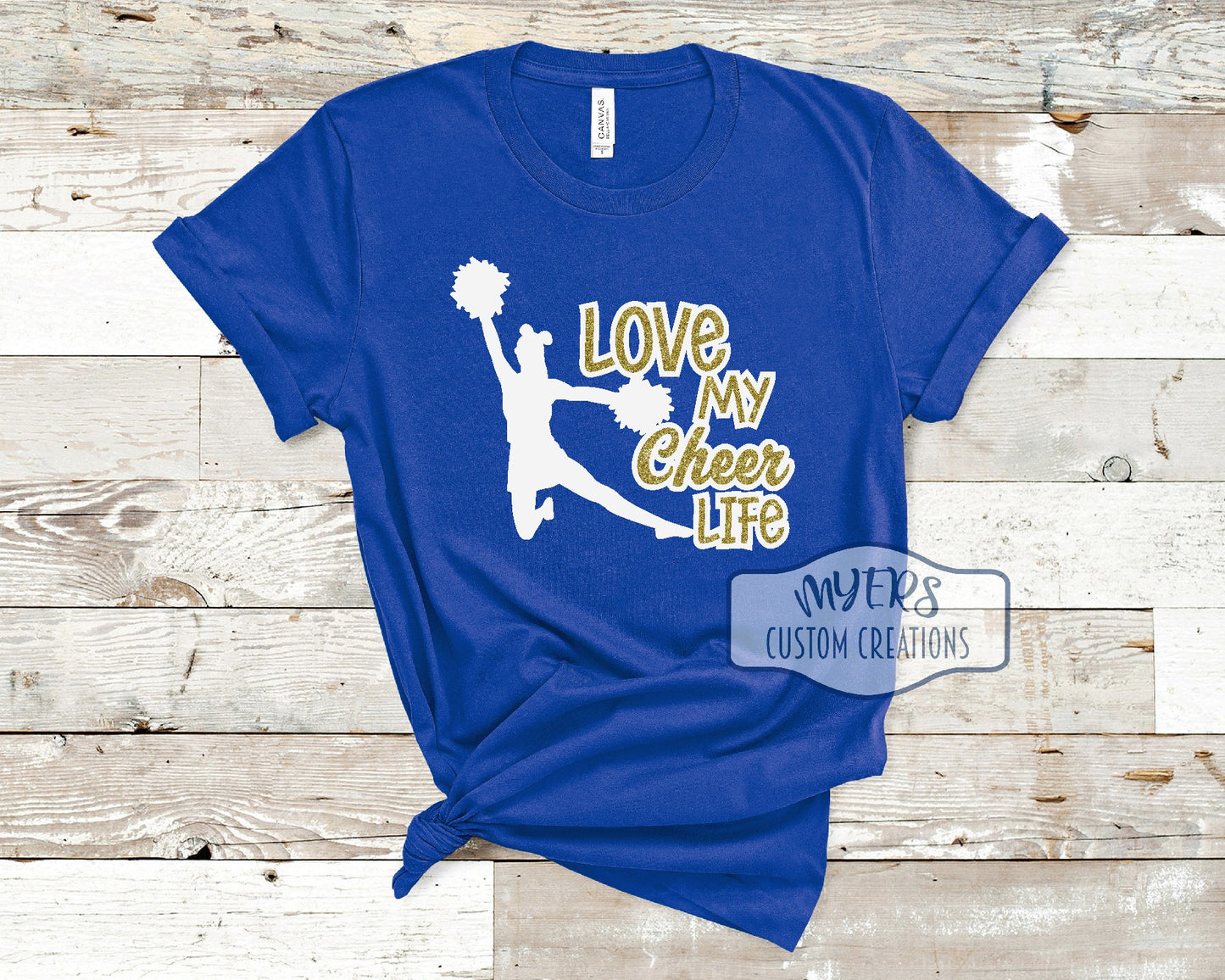 Love My Cheer Life royal blue Bella Canvas t-shirt with white and gold glitter HTV