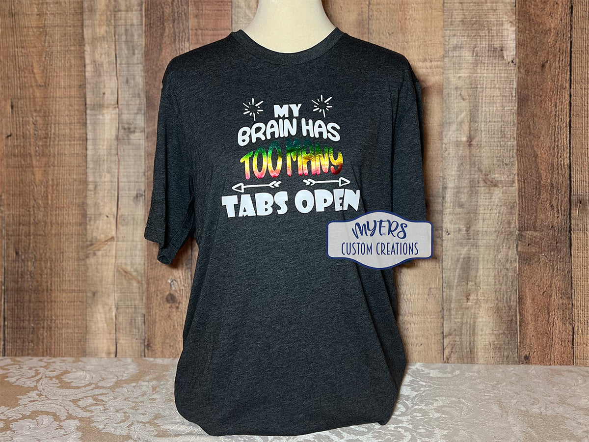My Brain Has Too Many Tabs Open heather dark grey t-shirt with white and metallic rainbow HTV RTS