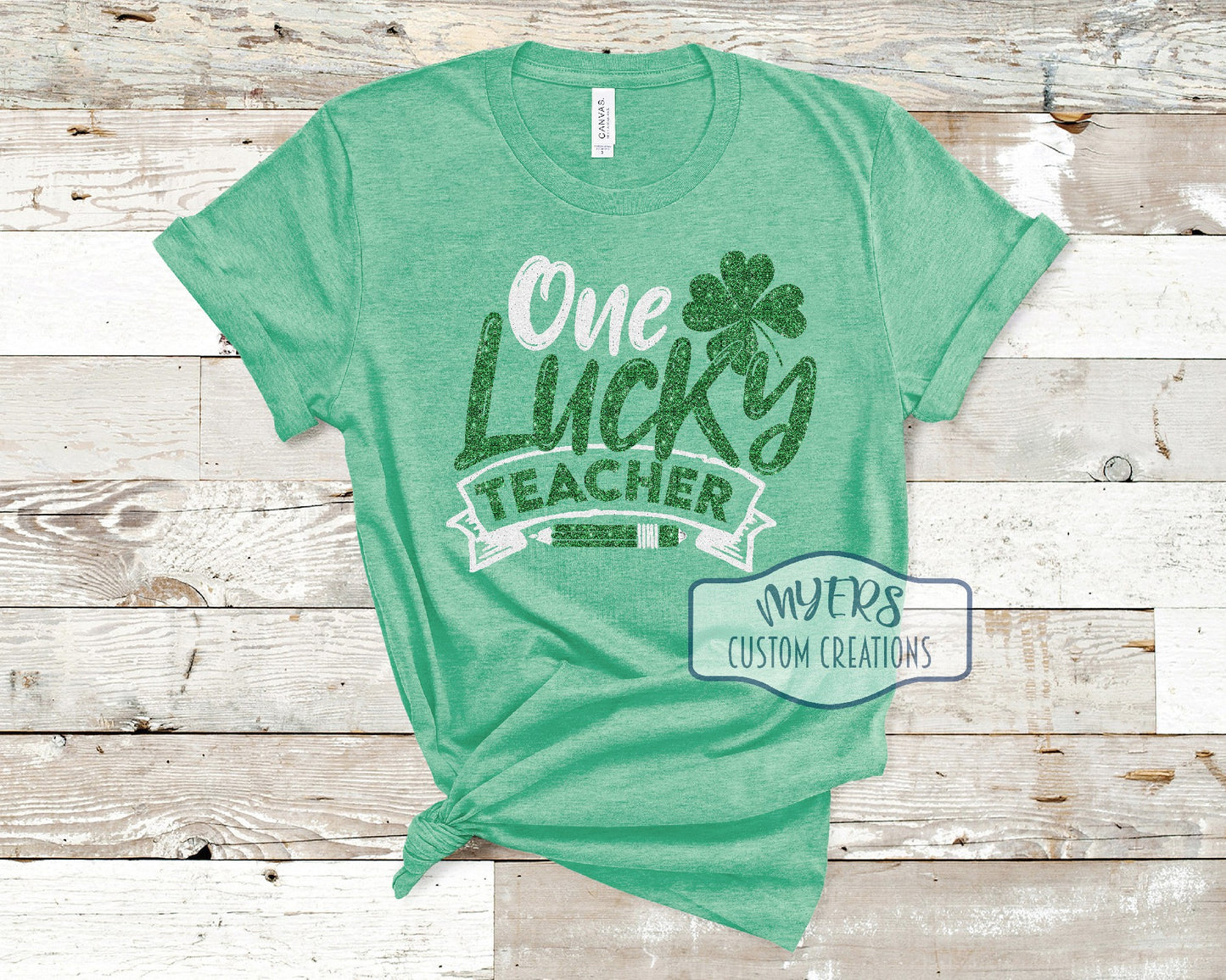 One Lucky Teacher heather kelly Bella Canvas t-shirt with white glitter and green glitter HTV