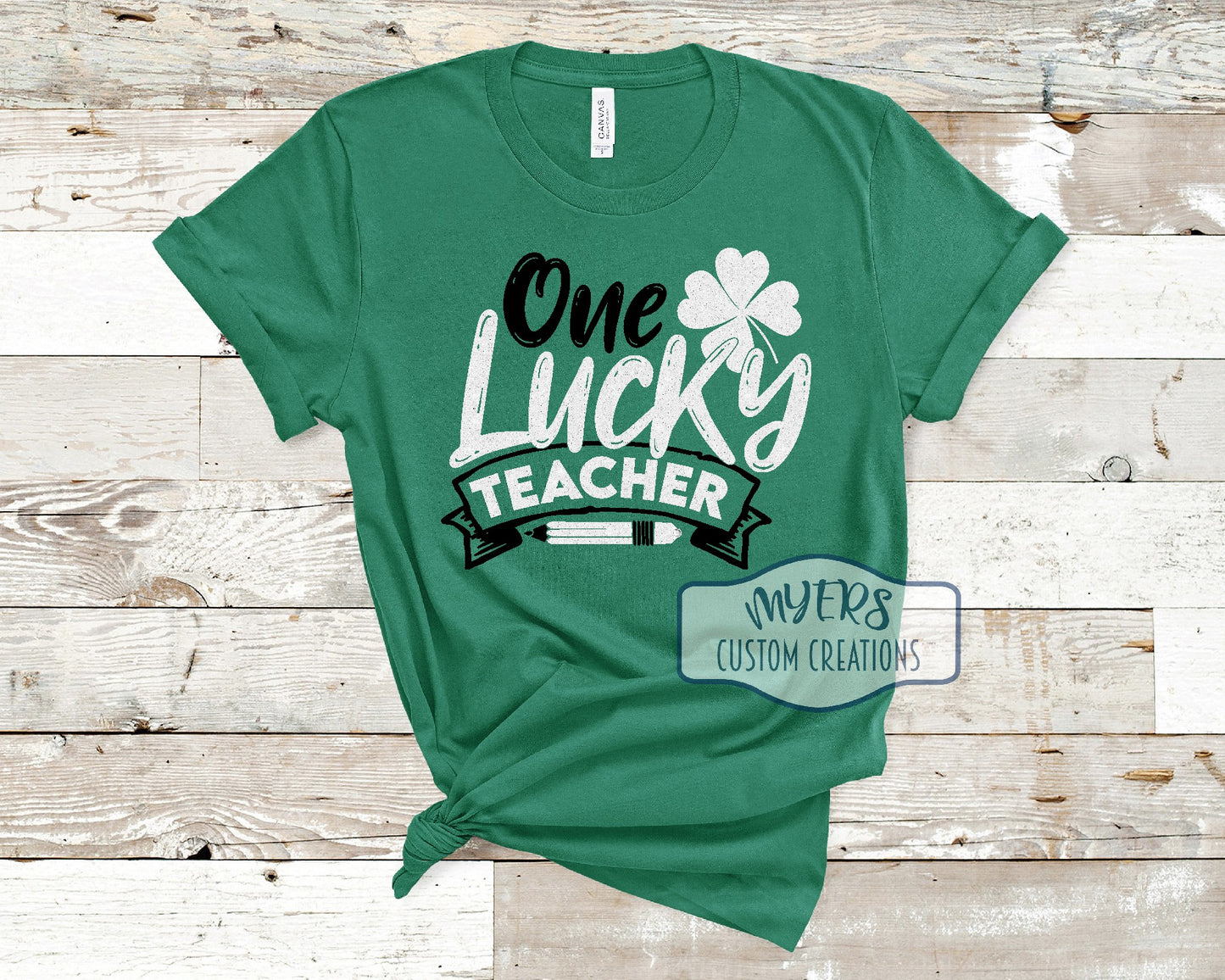 One Lucky Teacher kelly green Bella Canvas t-shirt with black and white glitter HTV