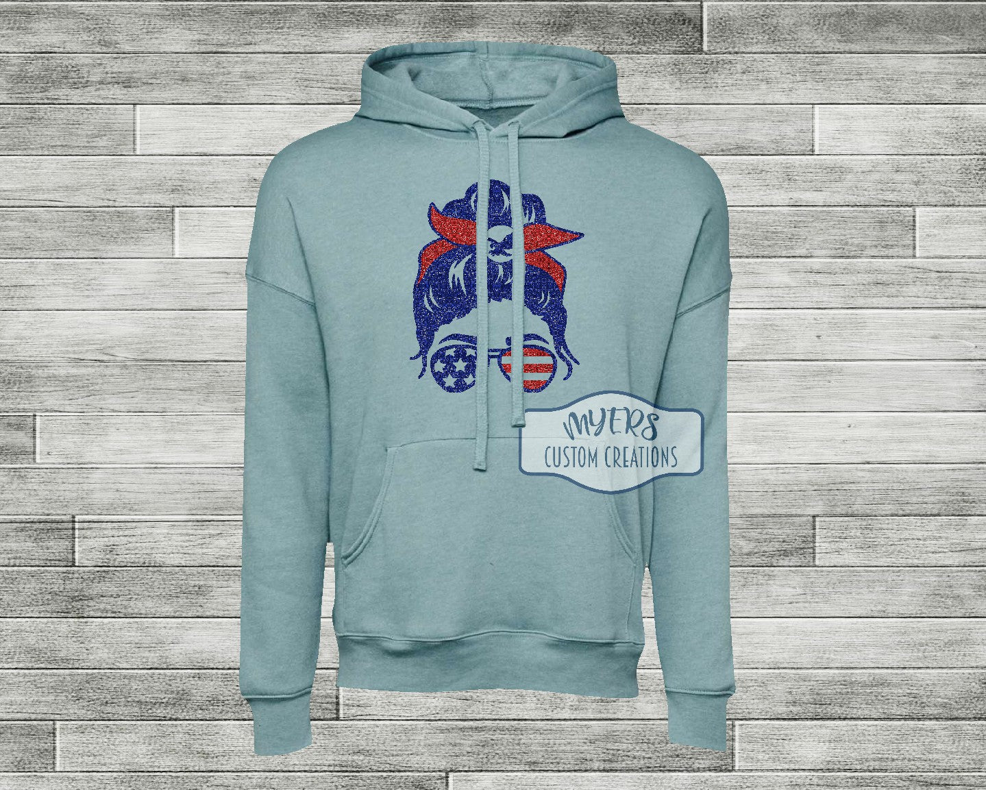 Patriotic Messy Bun heather blue lagoon Bella+Canvas hoodie with royal blue glitter and red glitter HTV