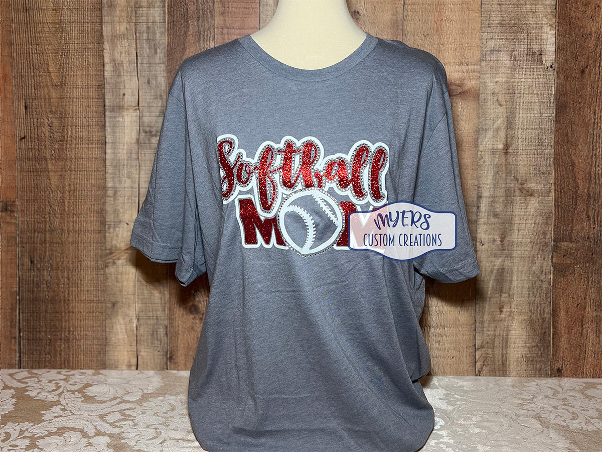 Softball Mom Multi-Dec heather storm t-shirt with white and red glitter HTV and crystal rhinestones