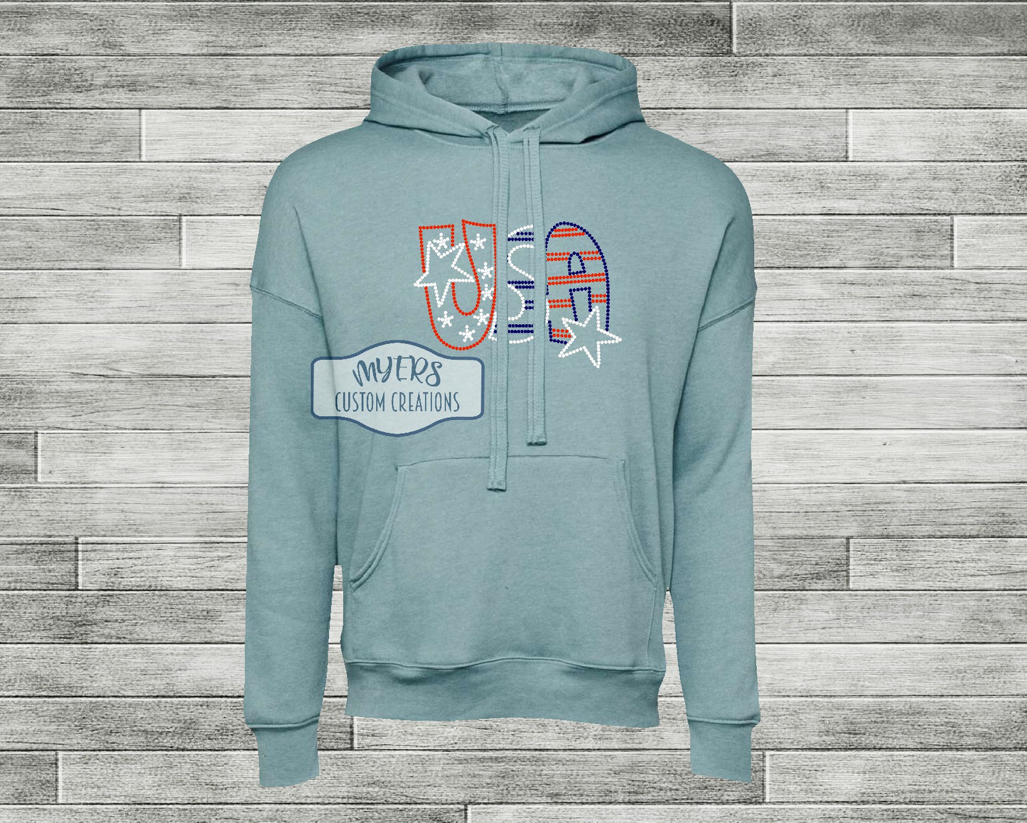 USA Rhinestone heather blue lagoon Bella+Canvas hoodie with red siam, crystal, and cobalt rhinestones
