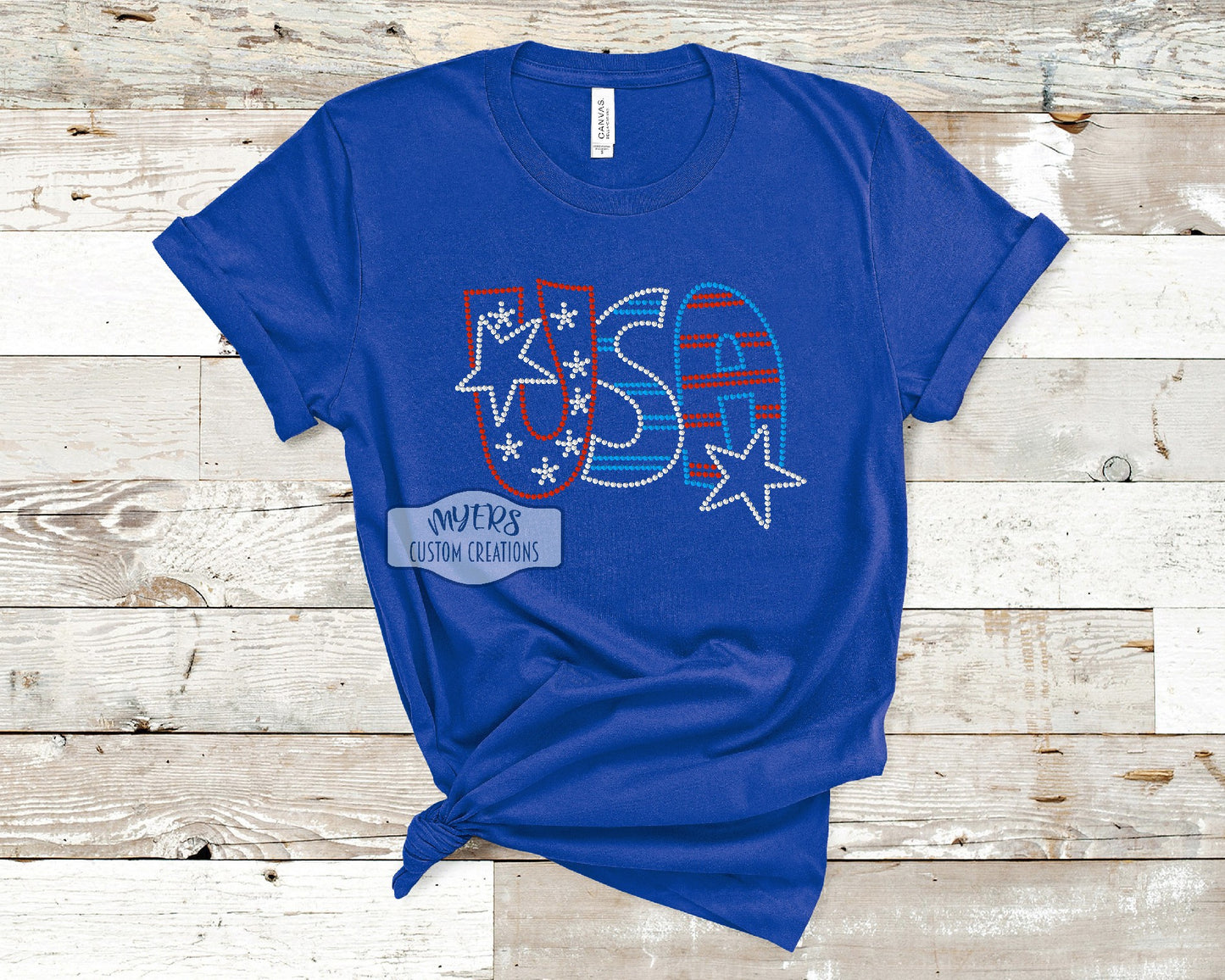 USA Rhinestone royal blue Bella+Canvas t-shirt with red siam, crystal, and blue rhinestones