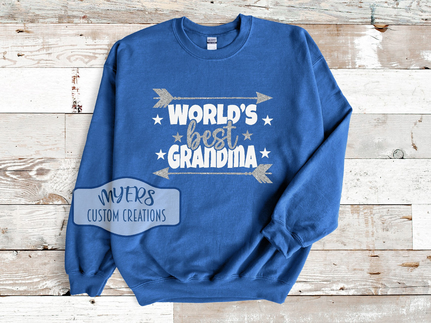 World's Best Grandma royal blue Gildan sweatshirt with silver glitter and white HTV