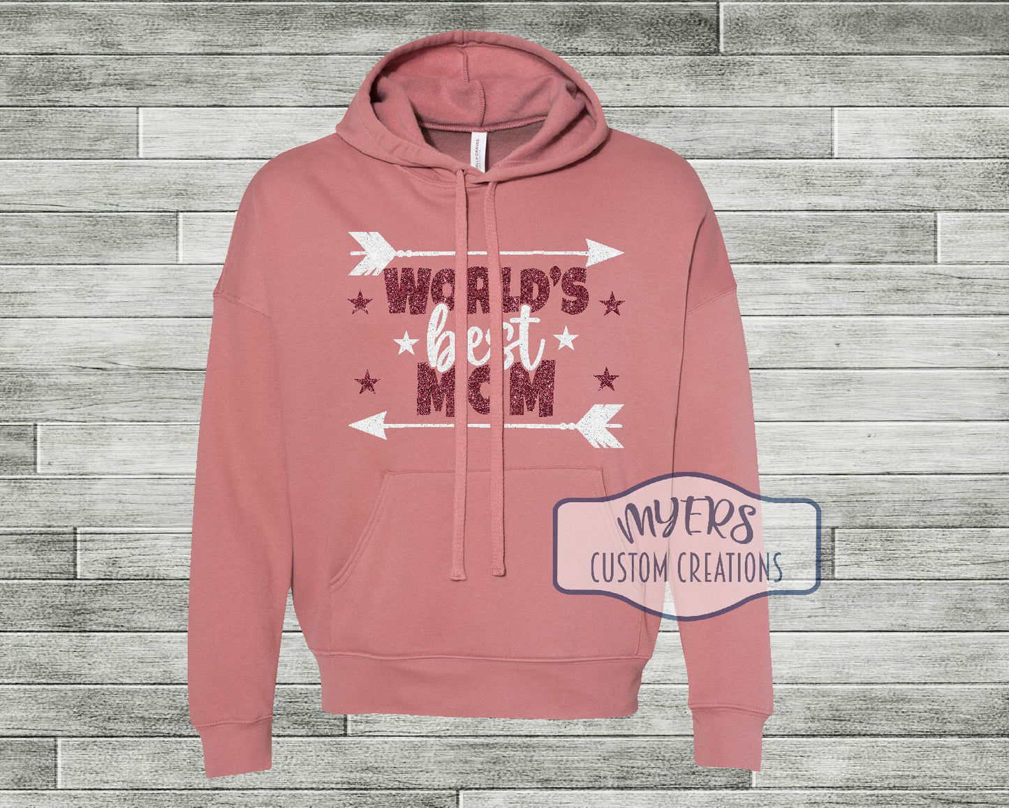 World's Best Mom mauve Bella+Canvas hoodie with white glitter and blush glitter HTV