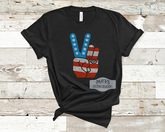 American Flag Peace Sign Rhinestone black Bella+Canvas t-shirt with blue, crystal, and red siam rhinestones