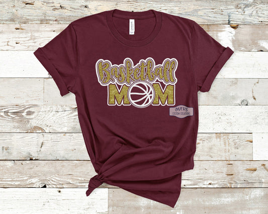Basketball Mom Rhinestone Multi-Dec maroon Bella+Canvas shirt with white glitter, gold glitter, and crystal rhinestones
