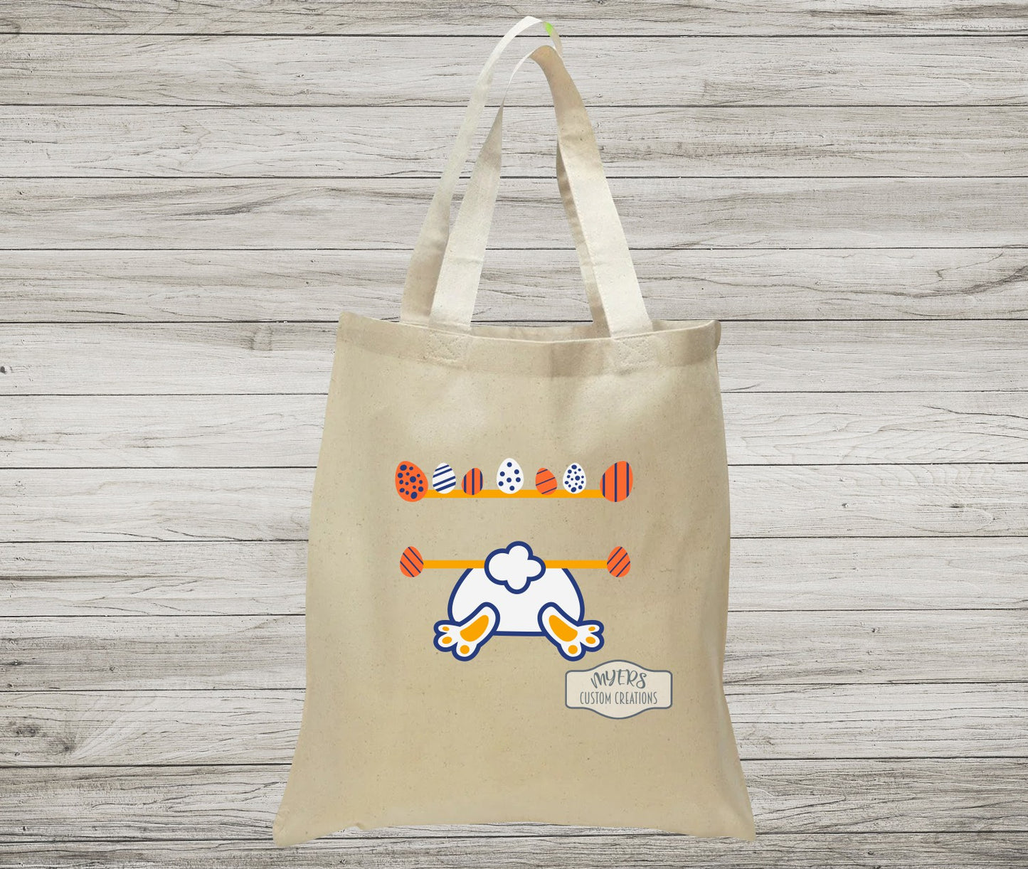 Easter Bunny Butt on a natural canvas Tote Bag with white, royal blue, and orange