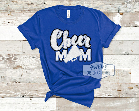 Cheer Mom royal blue Bella Canvas t-shirt with black and white glitter HTV and crystal rhinestones