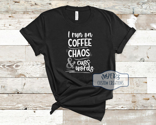 I Run on Coffee Chaos & Cuss Words black Bella+Canvas t-shirt with white and silver metallic HTV