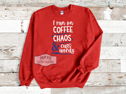 I Run on Coffee Chaos & Cuss Words red Gildan sweatshirt with white and royal blue HTV