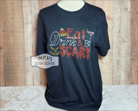 Eat Drink and Be Scary Rhinestone Shirt on Black Bella+Canvas t-shirt with crystal, orange, and citrine rhinestones