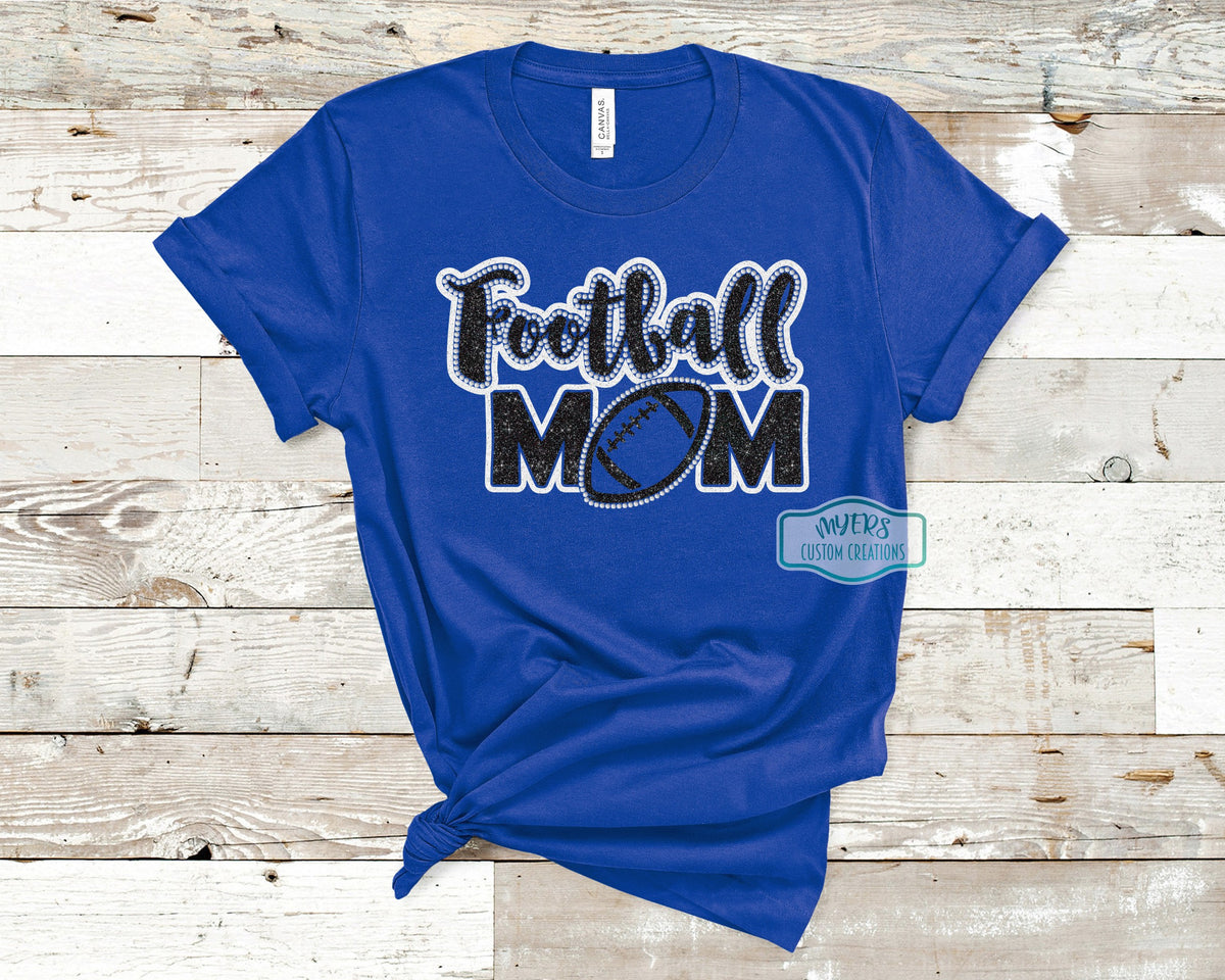 Football Mom Rhinestone Multi-Dec royal blue Bella+Canvas shirt with white glitter, black glitter, and crystal rhinestones