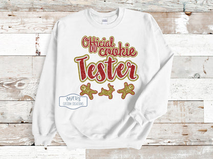 Official Cookie Tester on a white Gildan sweatshirt with gold glitter & red glitter HTV and crystal rhinestones