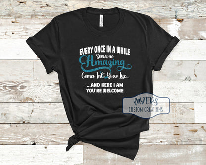 Someone Amazing black Bella Canvas t-shirt with white and aqua glitter HTV