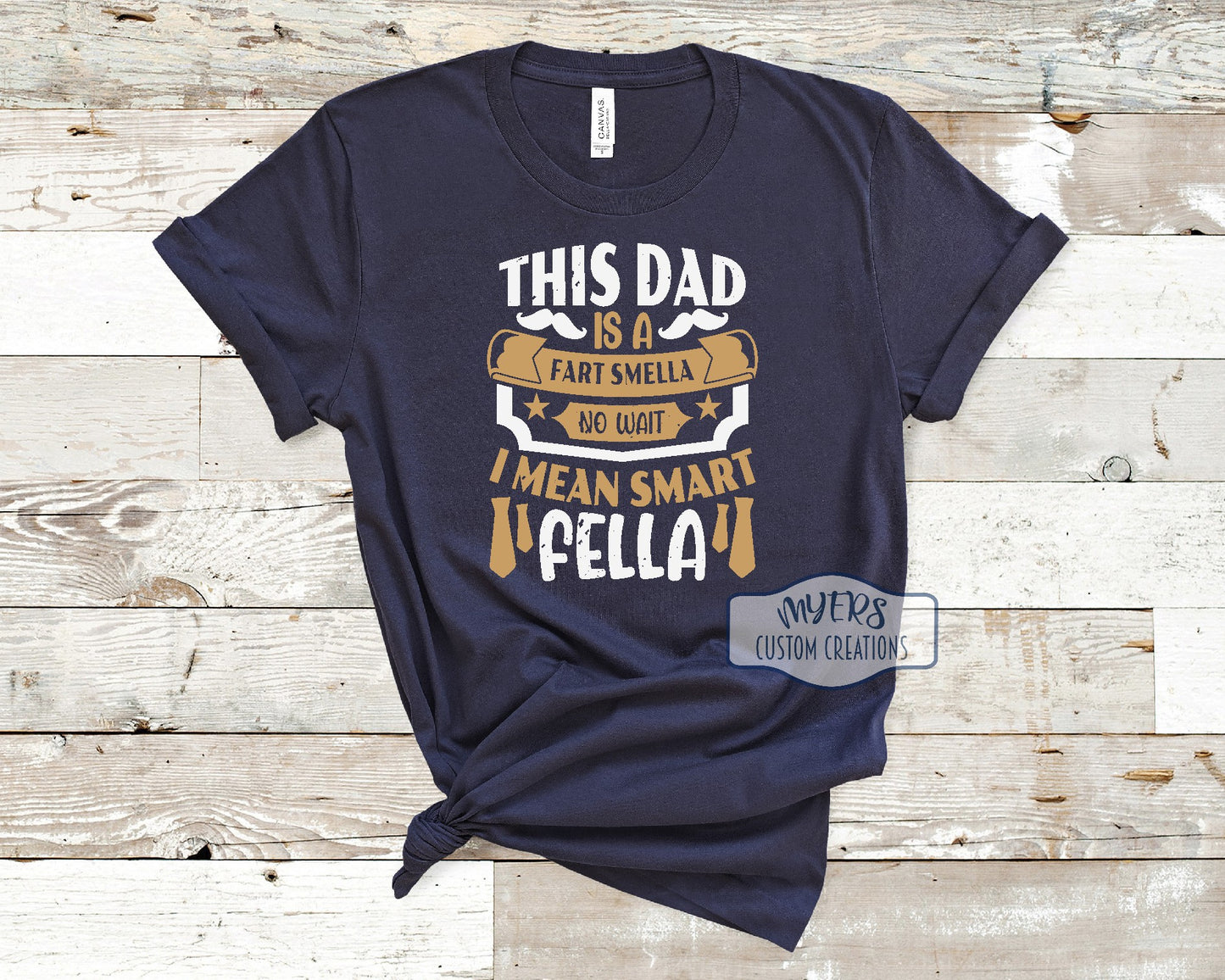 This Dad is a Fart Smella navy Bella+Canvas t-shirt with white and tan HTV